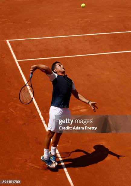 Nicolas Almagro of Spain serves during the men's singles second round match against Juan Martin Del Potro of Argentina on day five of the 2017 French...