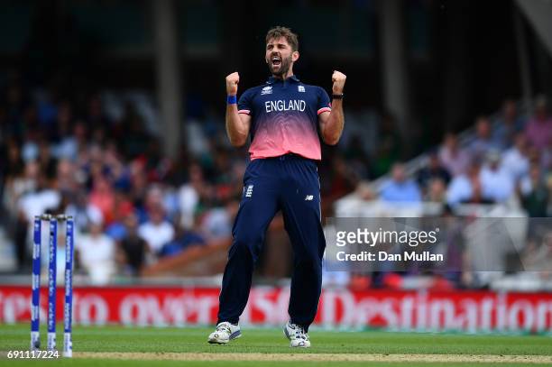 Liam Plunkett of England celebrates taking the wicket of Mushfiqur Rahim of Bangladesh during the ICC Champions Trophy Group A match between England...