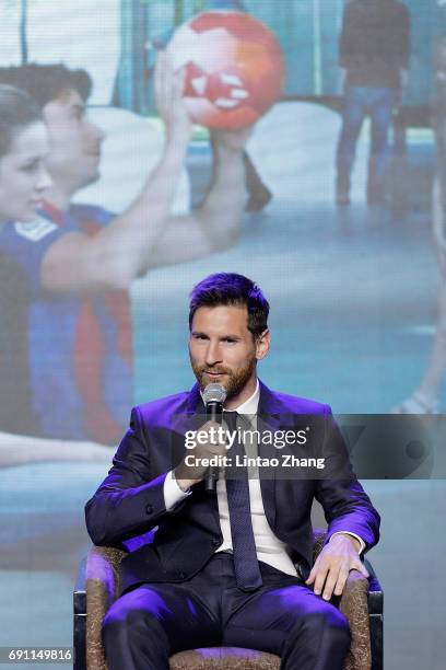 Barcelona's striker Lionel Messi speaks during a news conference at China World Trade Center Grand Hotel on June 1, 2017 in Beijing, China. Messi...