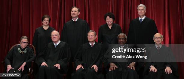 Front row from left, U.S. Supreme Court Associate Justice Ruth Bader Ginsburg, Associate Justice Anthony M. Kennedy, Chief Justice John G. Roberts,...