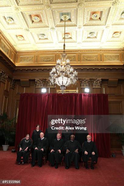 Front row from left, U.S. Supreme Court Associate Justice Ruth Bader Ginsburg, Associate Justice Anthony M. Kennedy, Chief Justice John G. Roberts,...