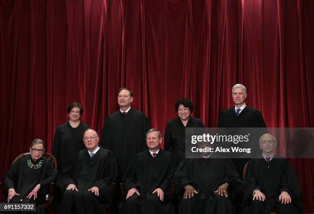 Front row from left, U.S. Supreme Court Associate Justice Ruth Bader Ginsburg, Associate Justice Anthony M. Kennedy, Chief Justice John G. Roberts,...