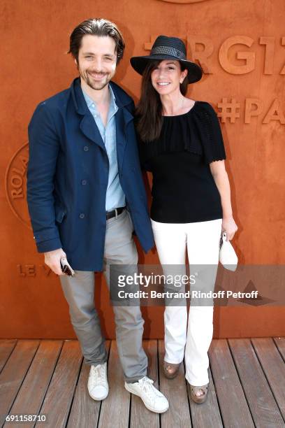 Actor Raphael Personnaz and Albane Cleret attend the 2017 French Tennis Open - Day Five at Roland Garros on June 1, 2017 in Paris, France.