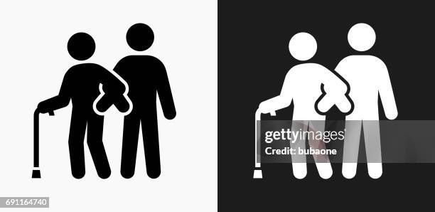 elderly assistance icon on black and white vector backgrounds - aged care vector stock illustrations