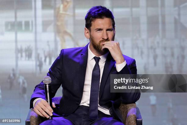 Barcelona's striker Lionel Messi speaks during a news conference at China World Trade Center Grand Hotel on June 1, 2017 in Beijing, China. Messi...