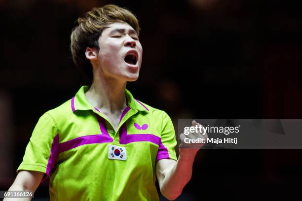 Jang Woojin of Republic of Korea celebrates during Men Single second round at Table Tennis World Championship at Messe Duesseldorf on June 1, 2017 in...