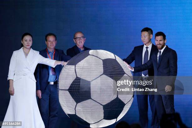 Barcelona's striker Lionel Messi with Zhang Wei attend the a news conference at China World Trade Center Grand Hotel on June 1, 2017 in Beijing,...