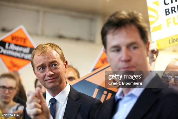 Tim Farron, leader of the Liberal Democrats, left, listens to Nick Clegg, former leader of the Liberal Democrats, during a general election campaign...