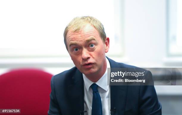Tim Farron, leader of the Liberal Democrats speaks with NHS staff on a visit to Kingston hospital during a general-election campaign stop in...
