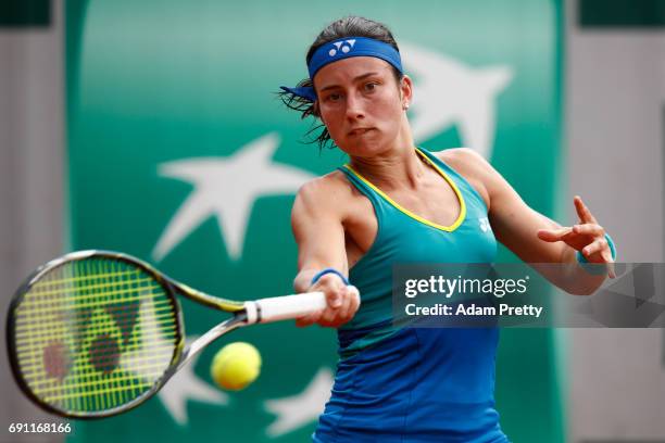 Anastasija Sevastova of Latvia hits a forehand during the ladies singles second round match against Eugenie Bouchard of Canada on day five of the...