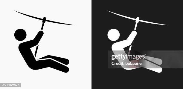 zip lining icon on black and white vector backgrounds - zip stock illustrations