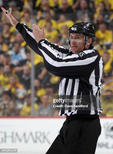 Linesman Shane Heyer officiates during the second period of Game Two of the 2017 NHL Stanley Cup Final between the Nashville Predators and the...