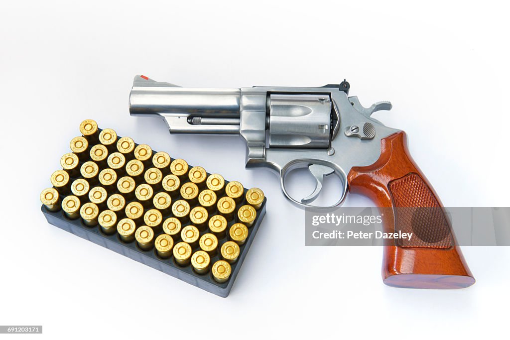 Overhead view of 44 Magnum gun with ammunition
