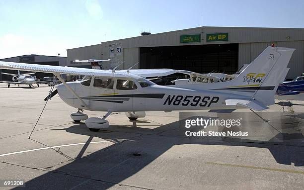 Single-engine Cessna aircraft sits on the tarmac outside a hangar January 8, 2002 at the St. Petersburg-Clearwater Airport International Airport used...