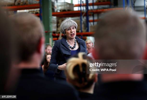 Britain's Prime Minister Theresa May attends an election campaign event at Ultima Furniture on June 1, 2017 in Pontefract, United Kingdom. All...