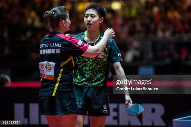 Petrissa Solja of Germany and Bo Fang of China celebrate their win of the quarter final at Table Tennis World Championship at Messe Duesseldorf on...