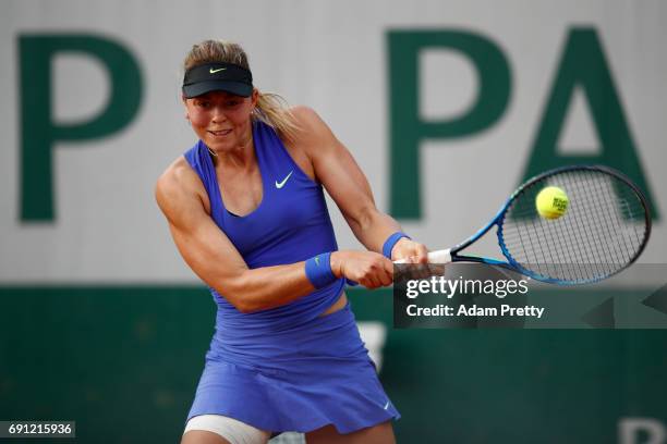 Carina Witthoeft of Germany hits a backhand during the ladies singles second round match against Pauline Parmentier of France on day five of the 2017...