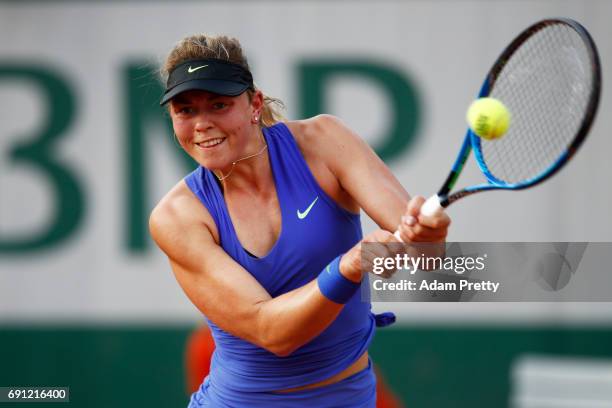 Carina Witthoeft of Germany hits a backhand during the ladies singles second round match against Pauline Parmentier of France on day five of the 2017...