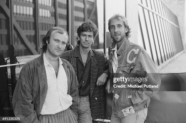 English rock group Genesis in Rosemont, Illinois, during the band's Invisible Touch Tour, October 1986. Left to right: singer/drummer Phil Collins,...