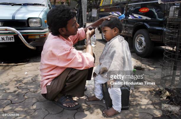 260 Hair Cutting India Photos and Premium High Res Pictures - Getty Images