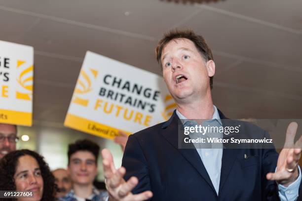 Former Liberal Democrat leader Nick Clegg takes part in the rally at the Shiraz Mirza Community Hall after visiting Kingston Hospital and meeting...