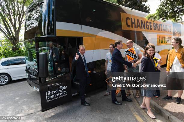Liberal Democrat leader Tim Farron and Nick Clegg , the former leader of the party arrive for the rally at the Shiraz Mirza Community Hall after...