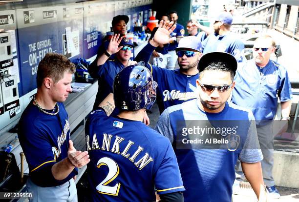 Nick Franklin of the Milwaukee Brewers celebrates scoring a run in the third inning against the New York Mets during their game at Citi Field on June...