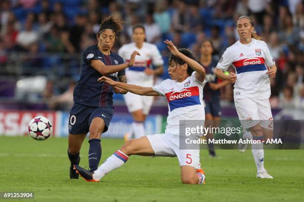 Cristiane of PSG is tackled by Saki Kumagai of Olympique Lyonnais during the UEFA Women's Champions League Final between Lyon and Paris Saint Germain...
