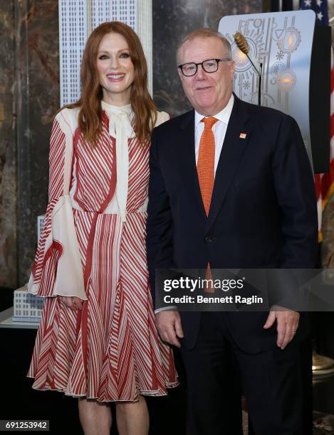 Actress Julianne Moore and John Feinblatt, President of Everytown for Gun Safety light The Empire State Building to honor Nation Gun Violence week at...