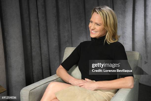 Michael Strahan interviews Robin Wright on "Good Morning America," airing Tuesday, May 30 on the Walt Disney Television via Getty Images Television...