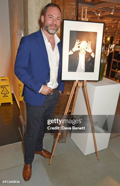 Tim Homewood, UK brand ambassador for Tanqueray, attends the Perfect Ten Exhibition in association with Tanqueray No. TEN at Harvey Nichols on June...