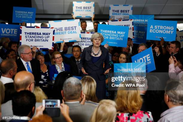 Britain's Prime Minister Theresa May speaks at an election campaign event at Pride Park Stadium on June 1, 2017 in Derby, United Kingdom. All parties...