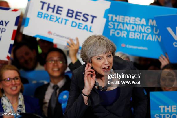 Britain's Prime Minister Theresa May speaks at an election campaign event at Pride Park Stadium on June 1, 2017 in Derby, United Kingdom. All parties...