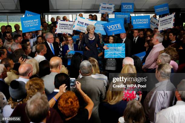 Britain's Prime Minister Theresa May speaks at an election campaign event at Pride Park Stadium on June 1, 2017 in Derby, United Kingdom. All parties...