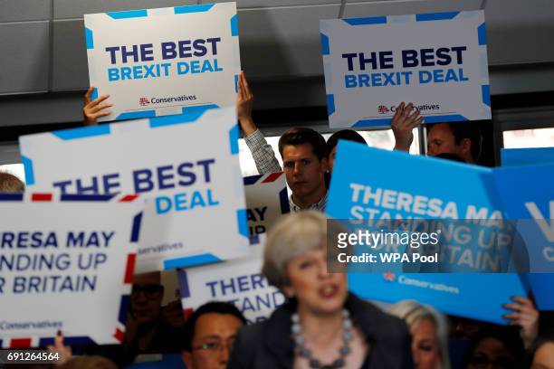 Britain's Prime Minister Theresa May speaks at an election campaign event at Pride Park Stadium on June 1, 2017 in Derby, United Kingdom. All parties...