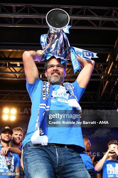 David Wagner head coach / manager of Huddersfield Town lifts the Sky Bet Championship play off trophy on May 30, 2017 in Huddersfield, England. David...