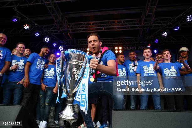 Danny Ward of Huddersfield Town with the Sky Bet Championship play offs trophy on May 30, 2017 in Huddersfield, England. Danny Ward