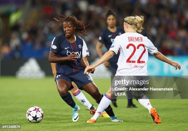 Grace Geyoro of Paris Saint-Germain Feminines evades Pauline Bremer of Olympique Lyonnais during the UEFA Women's Champions League Final between Lyon...