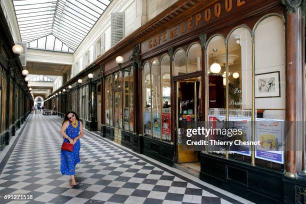 Pedestrian walks in the "Passage de la galerie Vero-Dodat" on June 01, 2017 in Paris, France. Built in 1826 the passage of the Vero-Dodat gallery...