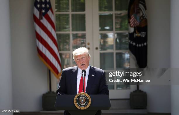 President Donald Trump announces his decision for the United States to pull out of the Paris climate agreement in the Rose Garden at the White House...