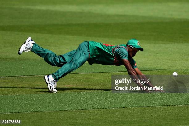 Rubel Hossain of Bangladesh dives to field a ball during the ICC Champions Trophy match between England and Bangladesh at The Kia Oval on June 1,...