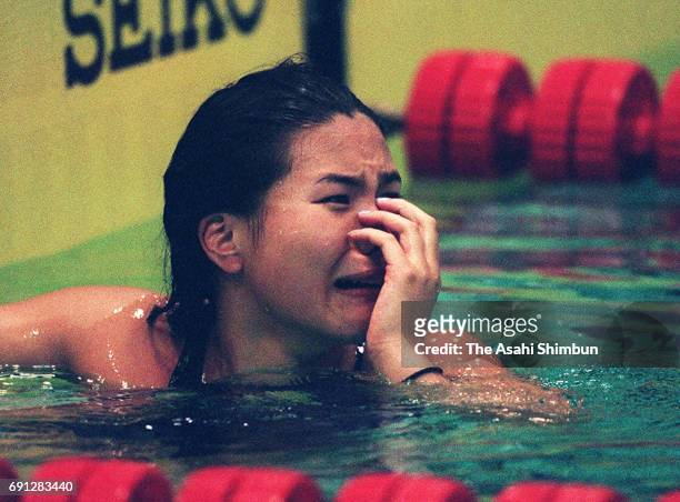 Yasuko Tajima of Japan shows dejection after finishing fourth in the Women's 400m Individual Medley during day two of the Pan Pacific Swimming...