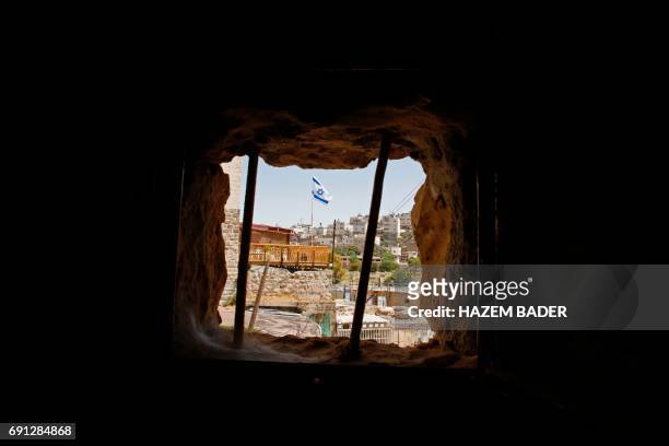 General view taken on May 8, 2017 shows houses owned by Jewish families before the 1967 Six-Day war and now occupied by Jewish settlers in the West...