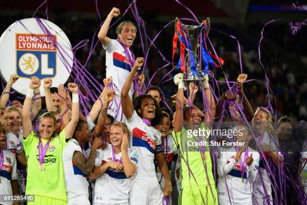 Olympic Lyon celebrate with the trophy after the UEFA Women's Champions League Final between Lyon and Paris Saint Germain at Cardiff City Stadium on...