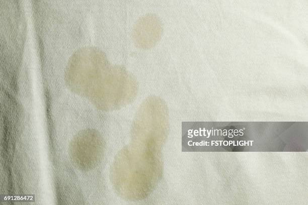 oil stain on white cloth - top garment stock pictures, royalty-free photos & images