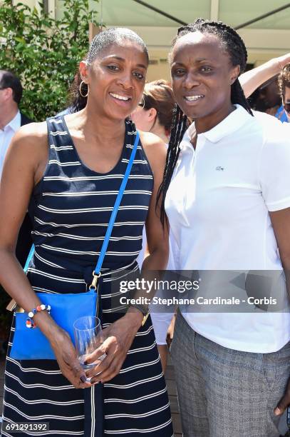 Olympics Champions Marie-Jose Perec and Eunice Barber attend the 2017 French Tennis Open - Day Five at Roland Garros on June 1, 2017 in Paris, France.