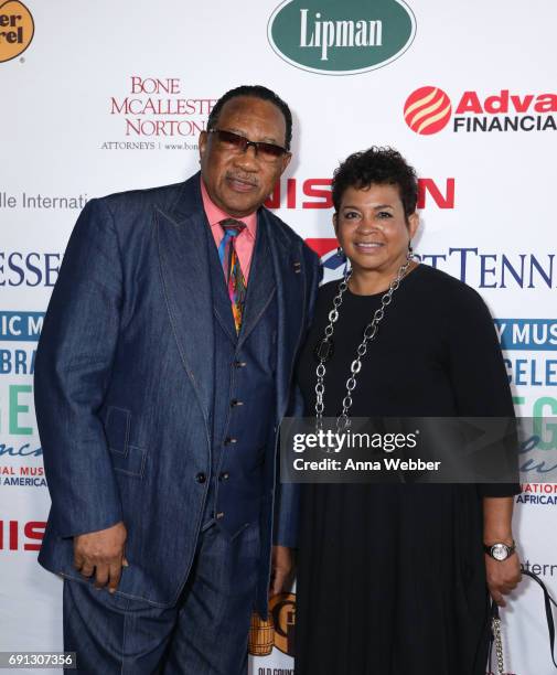 American Gospel singer and TV Host Dr. Bobby Jones and Guest arrive to the 4th Annual My Music Matters: A Celebration Of Legends Lunch at City Winery...