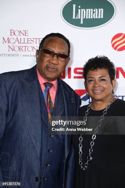 American Gospel singer and TV Host Dr. Bobby Jones and Guest arrive to the 4th Annual My Music Matters: A Celebration Of Legends Lunch at City Winery...