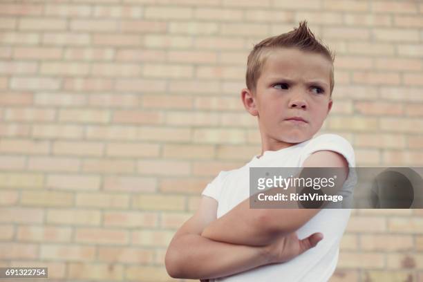 young rebellious boy 50s style - cruel stock pictures, royalty-free photos & images