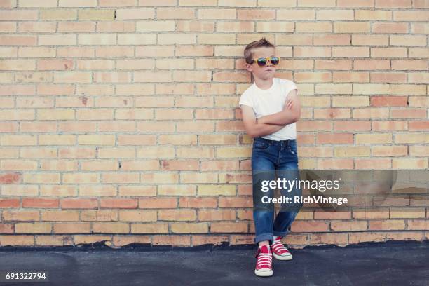 young rebellious boy 50s style - 1950 2016 stock pictures, royalty-free photos & images